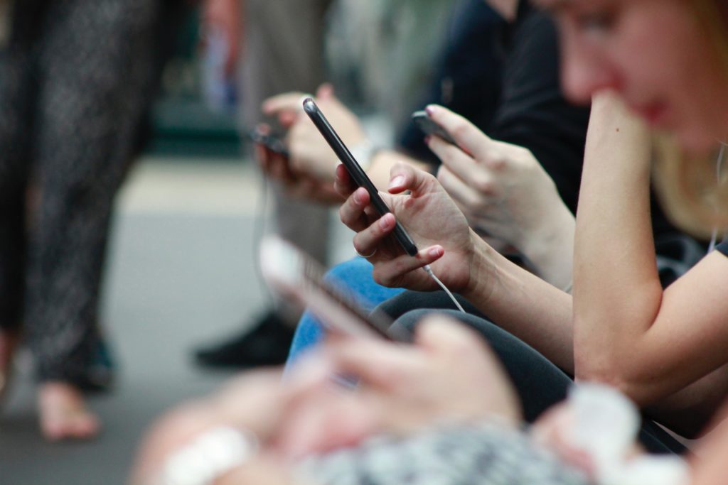 People holding mobile phone